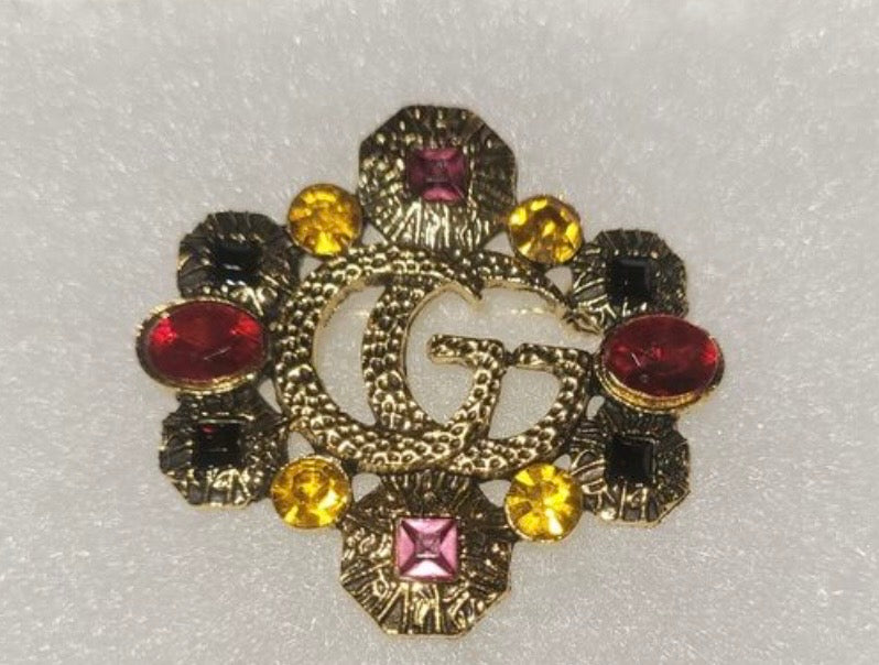 Designer inspired brooch