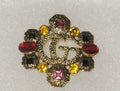Designer inspired brooch