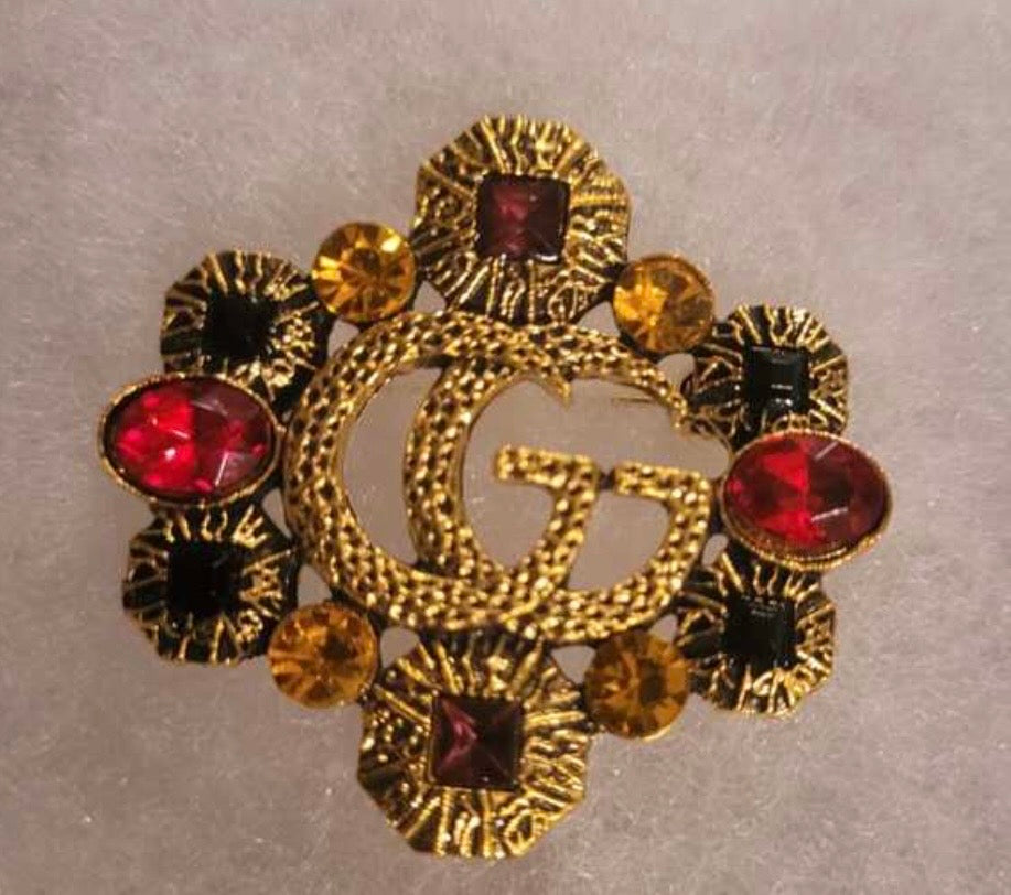 Designer inspired brooch